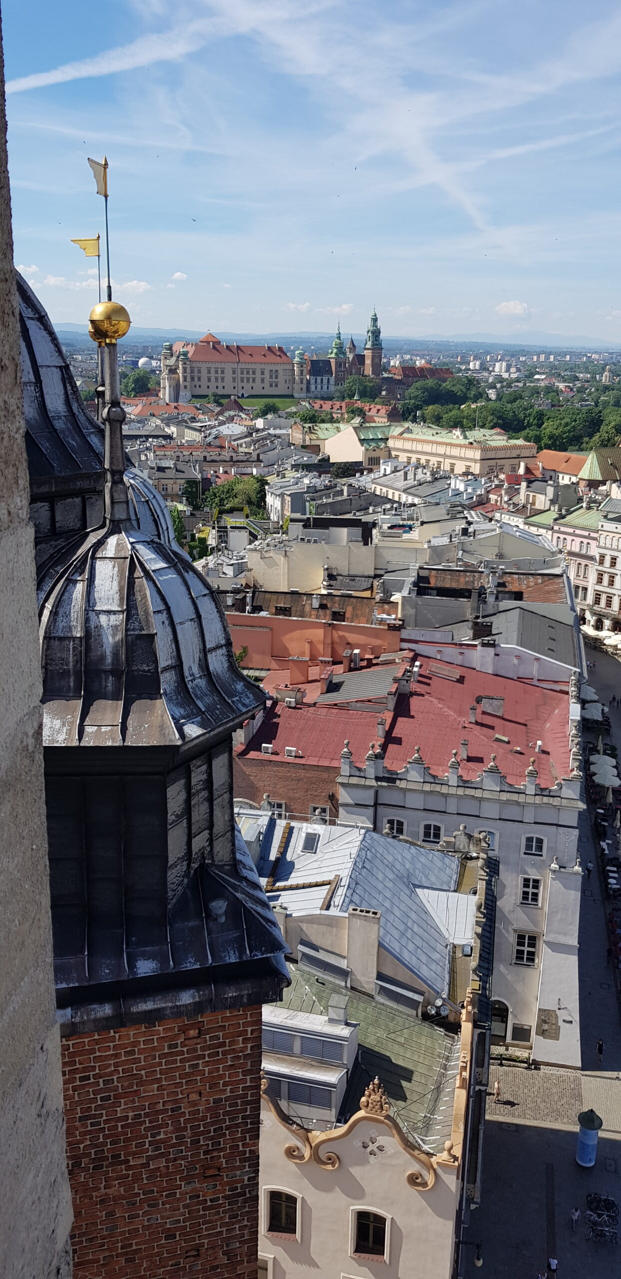 View of Kraków's main attractions including Wawel Castle, St. Mary's Basilica, and the historic streets of Grodzka and Kanonicza.